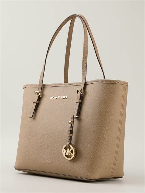 michael kors jet set tote logo brown|jet set small Michael Kors.